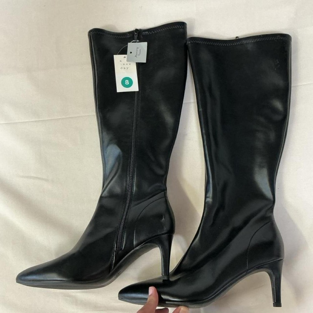 Black knee-high boots by A New Day